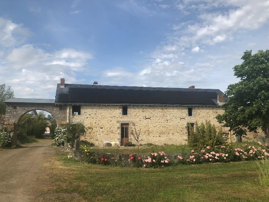 The converted farmhouse gîte with new slate roof