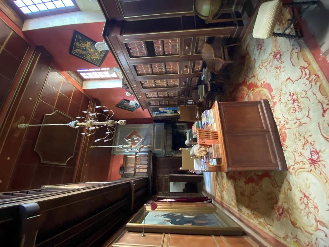 The double-height lounge-library with mezzanine